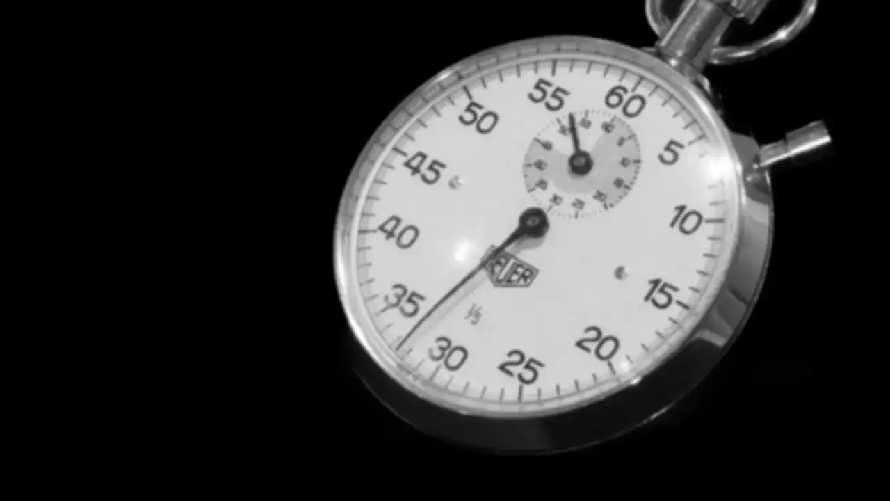 A stopwatch on a black background
